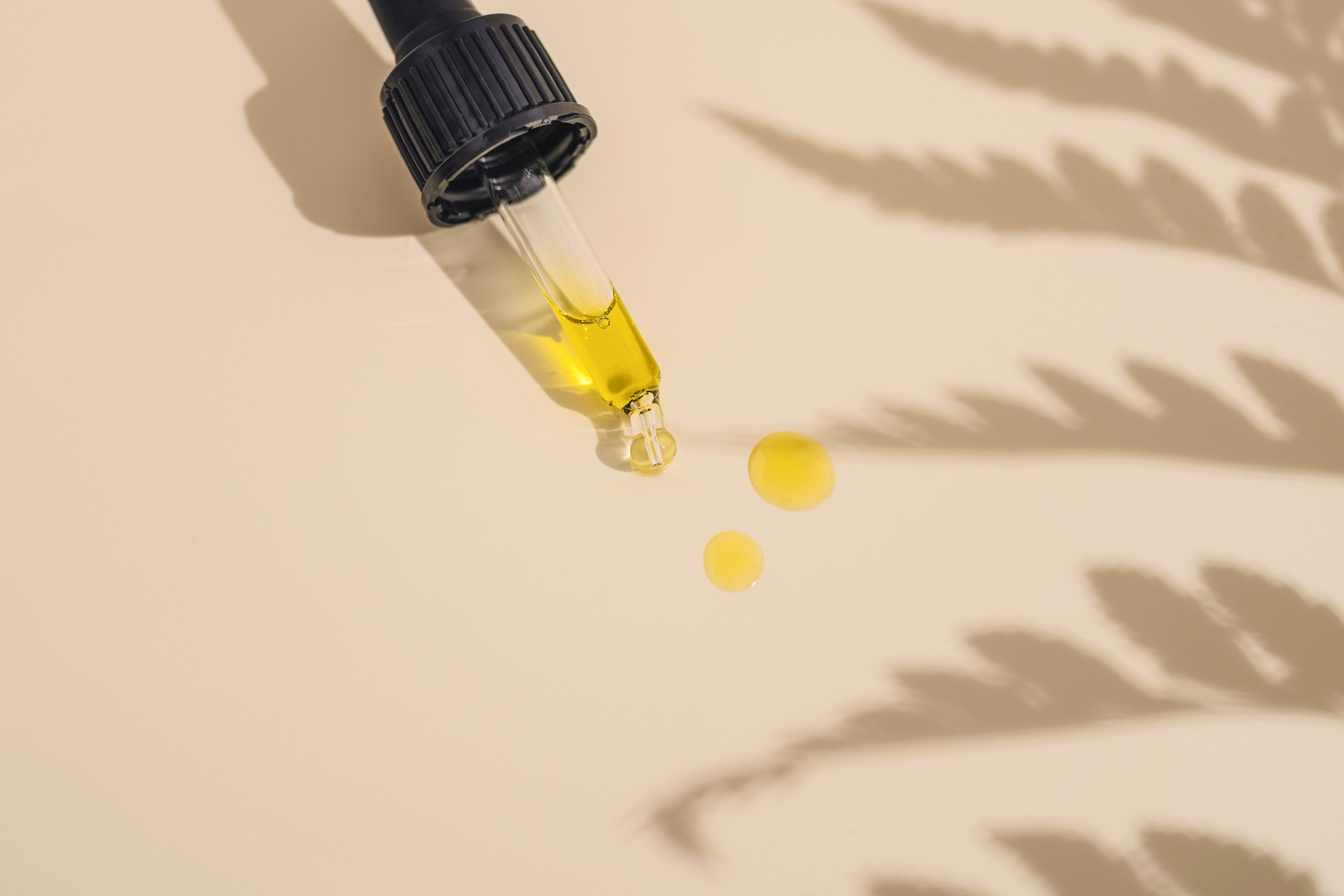 Skincare ingredients and product detail on a clean background