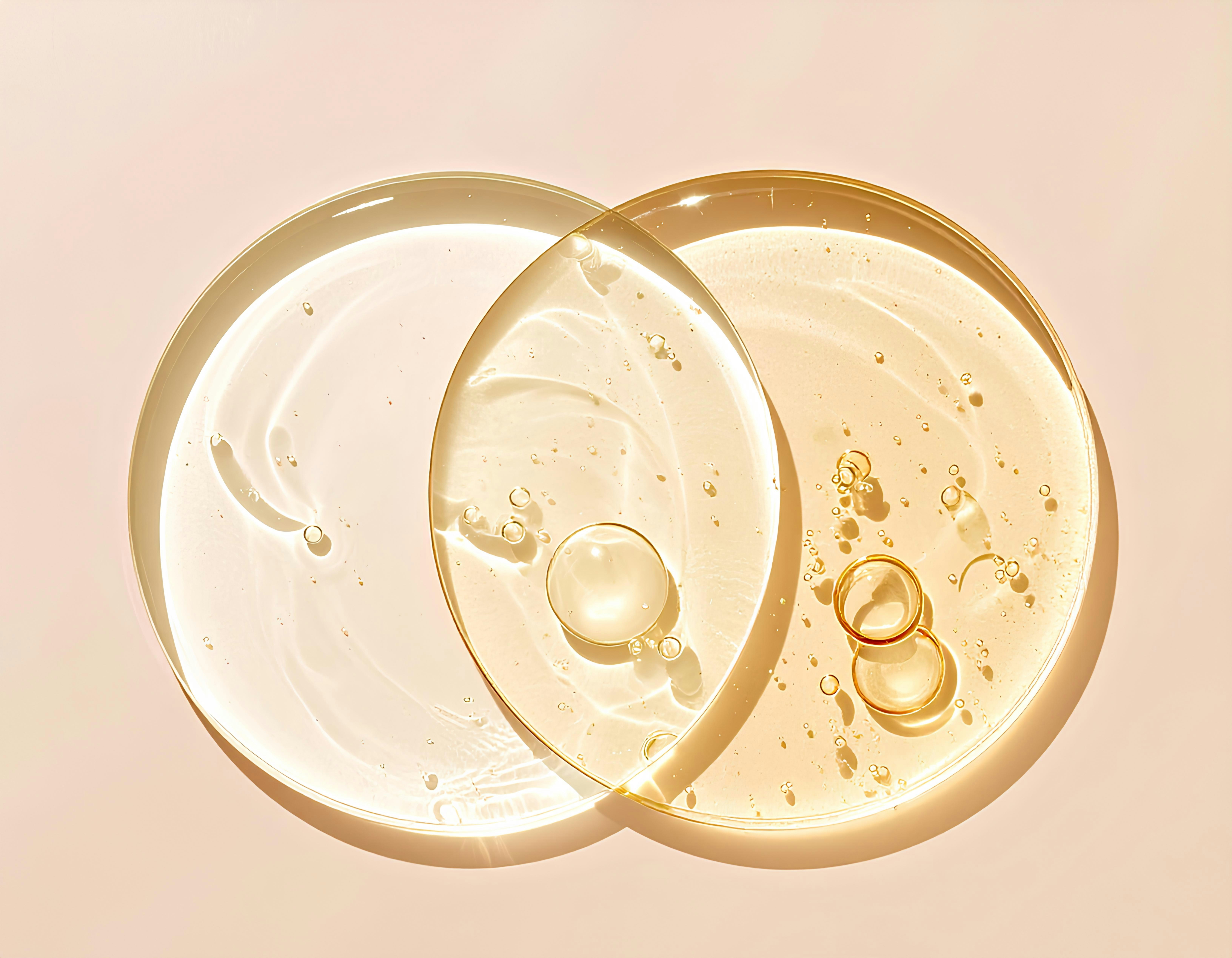 Two overlapping petri dishes with serum